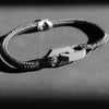 Aegis is a perfect match, made to stay with you forever. It is a minimalist and timeless rope bracelet, handcrafted from grade 5 titanium and a nearly indestructible rope. The 2 parts of the bracelet perfectly fit together in a unique and clever way, almost like a puzzle.